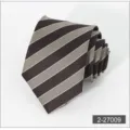 Close-up detail of brown and beige striped men's necktie rolled up neatly, business style texture. - 9
