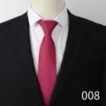 Detail shot of a sophisticated red and blue patterned business tie paired with formal attire. - Color 008