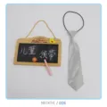 Detail view of the silver children's necktie featuring an elastic band and shiny finish. - Necktie/008