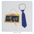 Detail view of the blue children's necktie with elastic band, neat fabric texture. - NECKTIE/017