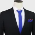 Classic men's royal blue necktie with matching pocket square for formal business suit wear. - Blue