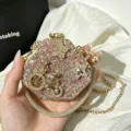 Exquisite hexagonal rhinestone evening clutch bag detail, sparkling pink crystals with gold chain. - Pink