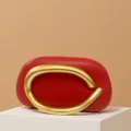 Red leather mini evening clutch bag with a bold retro gold-colored sculptural metal handle. - Matte Handle / Red