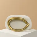 Elegant minimalist shoulder bag featuring a bold gold metal ring handle for evening style. - Matte Handle / Beige