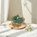 Detailed shot of sparkling rhinestone evening clutch, luxury green crystal mini chain handbag. - Green