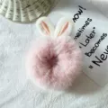 Pink plush rabbit ear hair scrunchie cute fuzzy hair band for women and girls daily wear detail shot - Pink