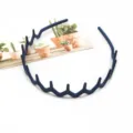 Closeup detail of dark blue matte wavy toothed non-slip hairband for daily makeup and washing. - Matte Wave Style (F-090) / Navy Blue