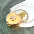 Borsa pochette con strass a forma di cuore dorato con motivo a trifoglio e catena. - Strass Forma Mela (Stile B5) / Oro