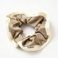 Elegant satin hair scrunchie with letter printed contrast trim for women daily styling. - Piping Scrunchie (AL-095-Coffee) / Approx. 11cm / Coffee