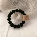 Black knitted hair tie with cute rabbit leather tag, elastic scrunchie for women and girls daily wear. - Black