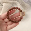 Brown knotted hair tie with cute rabbit tag, high elastic hair band for daily wear. - Coffee