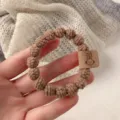 Brown knitted hair scrunchie with cute rabbit tag, high elasticity durable hair band for women. - Khaki