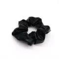 Close-up detail of black shiny hair scrunchie, elegant hair tie accessory for daily wear. - Black