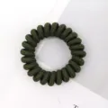 Dark green telephone wire hair tie detail, elastic spiral hair band, simple hair accessory. - Dark Green