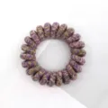 Close-up detail of vintage multi-color woven telephone wire hair tie, high elasticity. - Patterned Purple