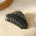 Black matte leaf hair claw clip for women, stylish elegant hair accessories for styling updos. - Black