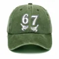 Vista dettagliata del cappellino da baseball verde slavato vintage con numeri e stampe di cartoni. - Adulto 56-60cm Regolabile / Verde