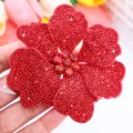 Red rhinestone flower patch close-up, sparkly crystal floral applique for shoes. - Red