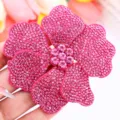 Close-up shot of shiny pink rhinestone flower patch, sparkling crystal details for DIY crafts. - Rose Red