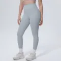 Detail view of high-waist yoga pants in light grey, smooth ice-silk fabric for fitness. - S / Bottoms / Rhino Gray