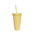 Solid yellow plastic cold tumbler cup with matching lid and reusable straw for beverages. - Beige