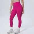 High-waisted pink yoga pants detail view, breathable and stretchy fabric for fitness running. - S / Bottoms / Wild Berry (7140)