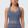 Blauwe sport-bh met contrasterende biesdetail, ademende fitness-yogakleding topjes. - S / Tops / Indigo
