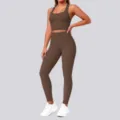 Detailed view of the seamless brown yoga set, highlighting the crop top and high-waisted leggings. - S / Top And Bottom / Chestnut Brown