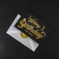 Schwarze Geburtstagskarte mit Goldfolie und Umschlag, elegantes Design für tolle Wünsche. - Goldener Kerzenwunsch