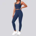 Seamless crop top and high-waist leggings yoga set in deep blue, showing fabric texture and fit. - S / Top And Bottom / Navy Blue