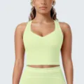 Dames lichtgroene sportbh en yogabroek set, ademende racerback fitness sportkleding. - S / Tops / Perzikroze