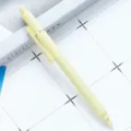 Minimalist solid color retractable gel pen in Morandi yellow, smooth rubber spray finish. - Candy Yellow