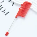 Red plastic tail comb with cute bow design, perfect for professional hair styling and salon use. - Bowknot Style / Red