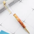 DIY kristallen lege buis balpen met marmergrip en gouden details. - Elegant amber