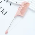 Pink plastic styling tail comb with cute bow design for hair dressing and parting. - Bowknot Style / Morandi Pink