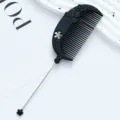 Black plastic flower hair comb with long metal tail pin, perfect for styling and parting hair. - Flower Style / Black