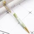DIY kristal lege buis balpen met groen marmerpatroon en gouden metalen accenten. - Elegant wit & groen
