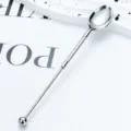 Long handle stainless steel coffee spoon with twisted design and decorative ball end for home bar. - Electroplated Silver