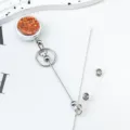 Round glitter badge reel with metal chain and clear strap for nurse ID card holder. - Orange