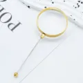 Handheld DIY beading magnifying glass with gold plated frame and long silver handle. - Gold