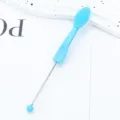Dual-sided silicone blackhead brush and nose cleaning tool with metal handle for daily facial care. - Sky Blue