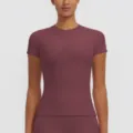 Detailed view of the women slim fit short sleeve athletic yoga sport top garment fabric. - S / Tops / Wine Red