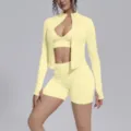Seamless solid color 3-piece activewear set, featuring zip jacket, sports bra, and shorts. - S / Set / Milk Yellow