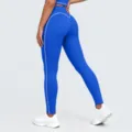 Pantalón de yoga azul real talle alto con líneas de contraste blancas, detalle legging. - Azul Tinta