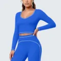 Blauwe contrastrand sport lange mouw crop top en legging fitness yoga set detail - S / Tops / Vulpen Blauw