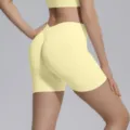 Seamless high-waisted yoga shorts in light yellow, V-waist peach lifting design for fitness. - S / Bottoms / Milk Yellow