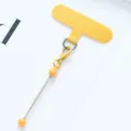 Yellow phone tether tab variant, durable phone case patch and lanyard attachment accessory. - Morandi Yellow
