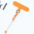 Orange mobile phone tether patch with metal charm extension for smartphone case lanyard. - Orange