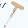 Universal mobile phone tether patch with metal charm strap lanyard accessory beige color. - Milk Tea