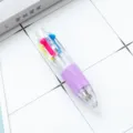 Mini stylo a bille multicolore 4-en-1 avec poignee violette et corps transparent neuf. - Violet bonbon (recharge blanche)